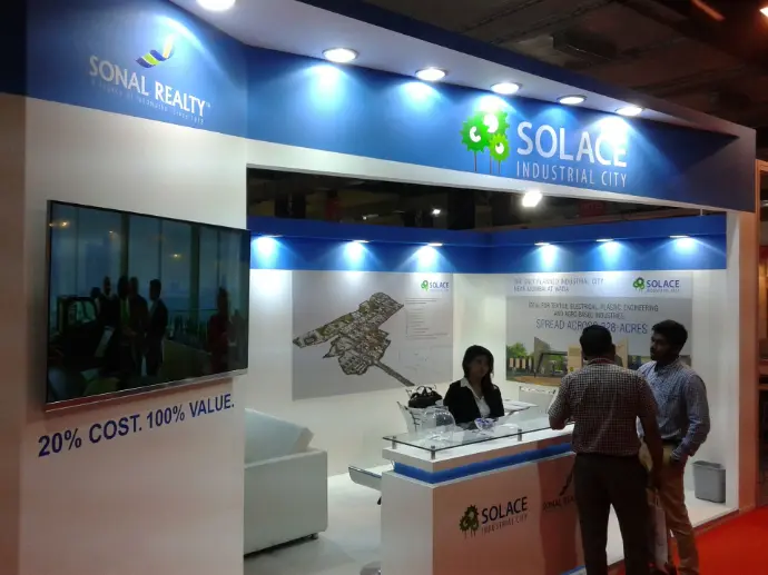 Contemporary blue and white trade show booth Prospect a real estate